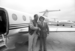 Bill Cosby with newly purchased jet by Tony Record