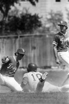 (T. C. U.) vs. Rice; (T. C. U.)'s Brent Barker (far left) confronts runner sliding at 2nd base by Vince Heptig