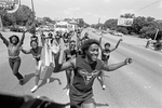 Joe McGhee leads fans of the Ernest McGhee Band in the Fort Worth Juneteenth parade by Ron T. Ennis