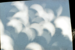 Partial solar eclipse at UTA by Allen Rose