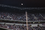 Eclipsed moon at The Ballpark in Arlington by Milton Adams