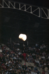 Eclipsed moon at The Ballpark in Arlington by Milton Adams