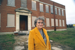 Mary Curtis outside vacant James E. Guinn school by Steve Gariepy
