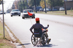 Mike Middleton acts as lunchtime crossing guard in his wheelchair for Berry Elementary School kindergartners by Bruce Maxwell