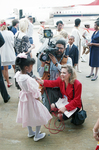 Jasmine Evans being interviewed after gifting Queen Elizabeth II with flowers by Paul Moseley