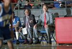 Dunbar High School basketball coaches Robert Hughes and Leondas Rambo during a game, Dunbar vs. O.D. Wyatt High School by Rodolfo Gonzalez