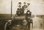 Group of people in an automobile