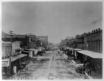 Fort Worth's Main Street looking south with street car and horse drawn buggies on stree