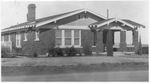 Brick residence owned by R. V. Prince dry goods merchant in Burleson, Texas