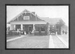 Thurber, Texas; Nile (Andreatto?) home, women sitting on porch, car under portico