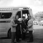 Arlington State College Rebels football team boarding a bus before the 11th Annual Junior Rose Bowl