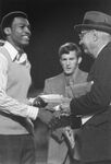 Greg Hunter, University of Texas at Arlington football player, receiving MVP award