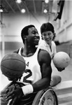 UTA Freewheeler wheelchair basketball player Abu Yilla with UTA volleyball player Judith McGill