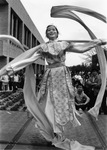 UTA's International Week dancer in costume