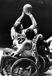 Basketball game action with UTA's Freewheelers wheelchair basketball