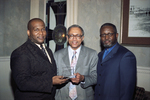 Maxwell Scarlett receiving UTA Outstanding African American Alumni Award