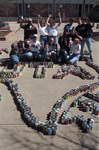 Homecoming with cans arranged in shape of Texas and letters "University of Texas at Arlington (U. T. A.)"