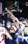 Women's basketball team celebrating a victory