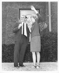 Kenny Terry and Donna Vee Owens, Mr. and Miss Rebel Spirit, with Confederate flags, 1966-67, Arlington State College (A. S. C.)