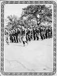 North Texas Agricultural College (N. T. A. C.) R. O. T. C. (Reserve Officers' Training Corps) students marching