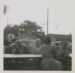 Photo of Warren C. Cowen and three unidentified women