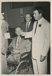 Photo of Warren C. Cowen and unidentified people
