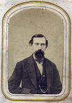 Man with beard sitting for photo portrait