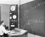 Man working in a control room by W. D. Smith