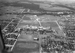 Aerial view of Texas Christian University (T.C.U.) and a block of apartments by W. D. Smith