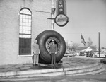 Air Accessories--two men with B-36 tire by W. D. Smith