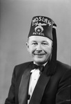 Portrait photograph of F. C. Cantrell in Moslah Patrol fez by W. D. Smith