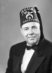 Portrait photograph of an unidentified man in Moslah Shriners director's fez by W. D. Smith