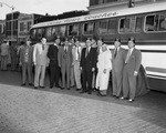 Moslah group in front of Texas Motor Coaches bus by W. D. Smith