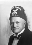 Portrait of a man wearing a tuxedo and a Moslah potentate fez by W. D. Smith