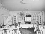 A hotel ballroom set for a banquet by W. D. Smith