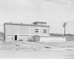 A building with door and windows open by W. D. Smith