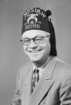 Portrait photograph of unidentified man weaing Moslah President Directors 1945 fez by W. D. Smith