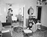 Lavenia Alexander (far left) testing camera flash by W. D. Smith