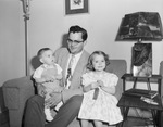 Gordon Smith with his children, Nancy and Dan Smith by W. D. Smith