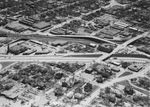 Aerial of neighborhood and businesses by W. D. Smith