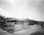 Robertson-Mueller-Harper Funeral Home under construction by W. D. Smith