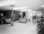 Employee sitting at River Oaks State Bank by W. D. Smith