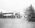 Exterior view of home and front lawn by W. D. Smith