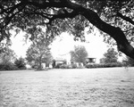 Exterior view of home and front lawn by W. D. Smith