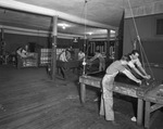 Employees in a workshop by W. D. Smith