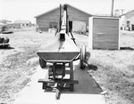 Farm elevator and equipment outside the Traders Cotton Oil Mill Co. plant by W. D. Smith