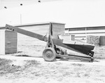 Farm elevator and equipment outside the Traders Cotton Oil Mill Co. plant by W. D. Smith