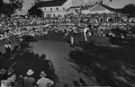 Craig Wood sinking winning putt by W. D. Smith