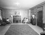 Hospital room with two women and a nurse by W. D. Smith