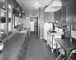 A kitchen in a building at Eagle Mountain Lake by W. D. Smith